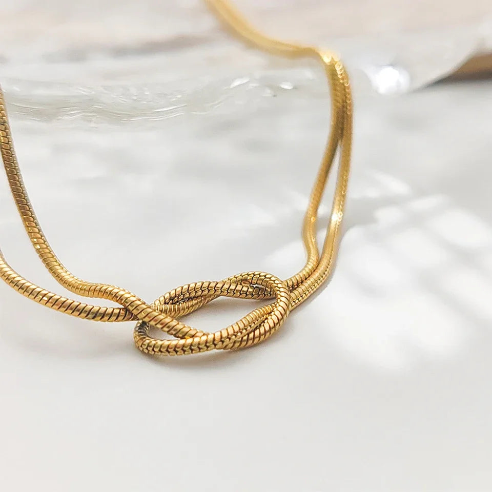 Elegant Gold-Plated Knotted Snake Chain Necklace